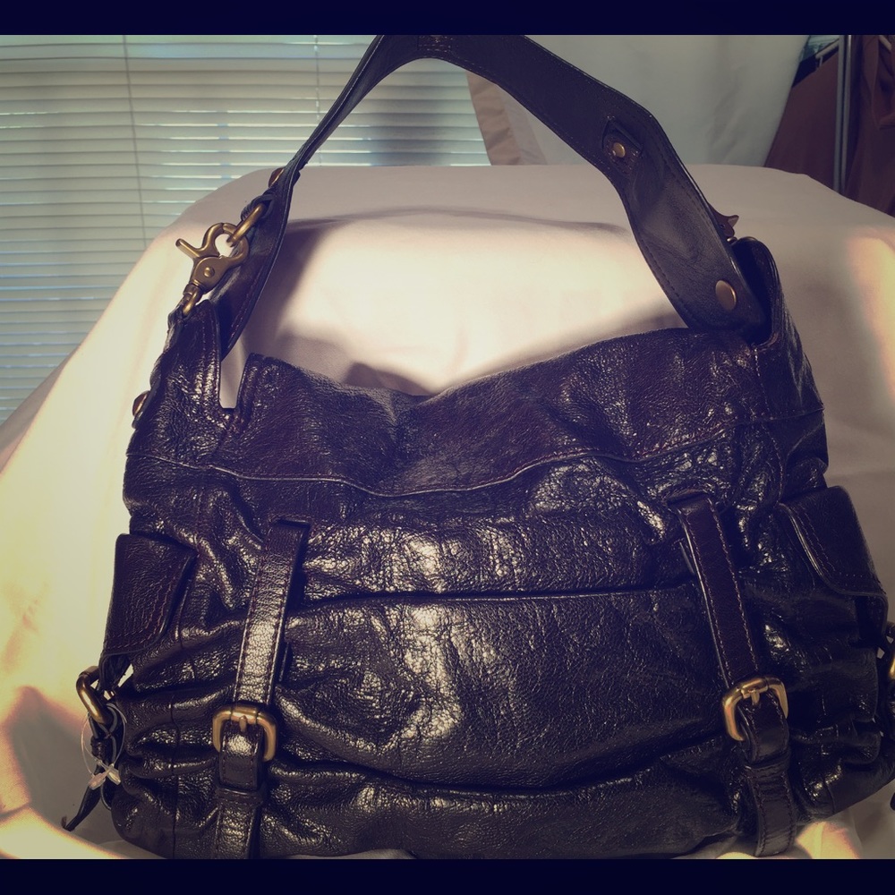 Brown leather handbag by Kooba